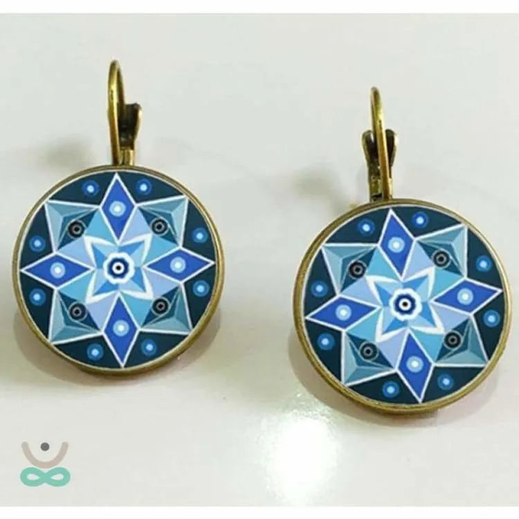 Aretes Mandala – Elegancia artesanal en cobre
