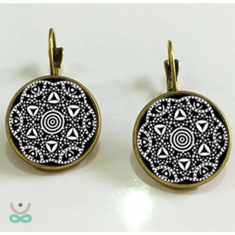 Aretes Mandala – Elegancia artesanal en cobre