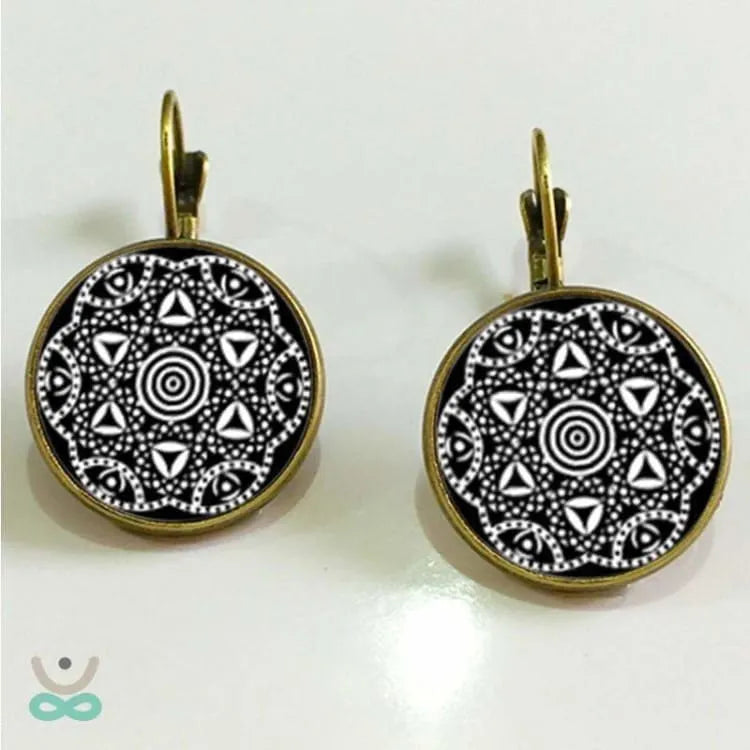 Aretes Mandala – Elegancia artesanal en cobre