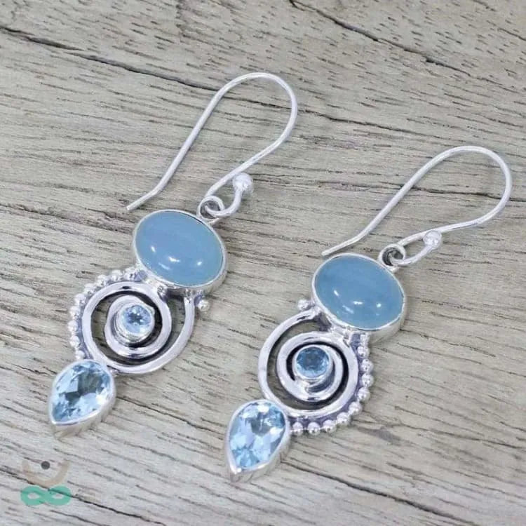 Aretes de plata tailandesa con piedra lunar natural - Energía femenina y serenidad