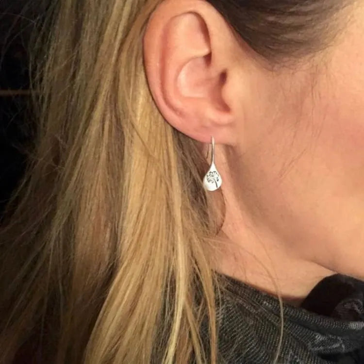 Aretes inspirados en la naturaleza un símbolo de libertad y felicidad