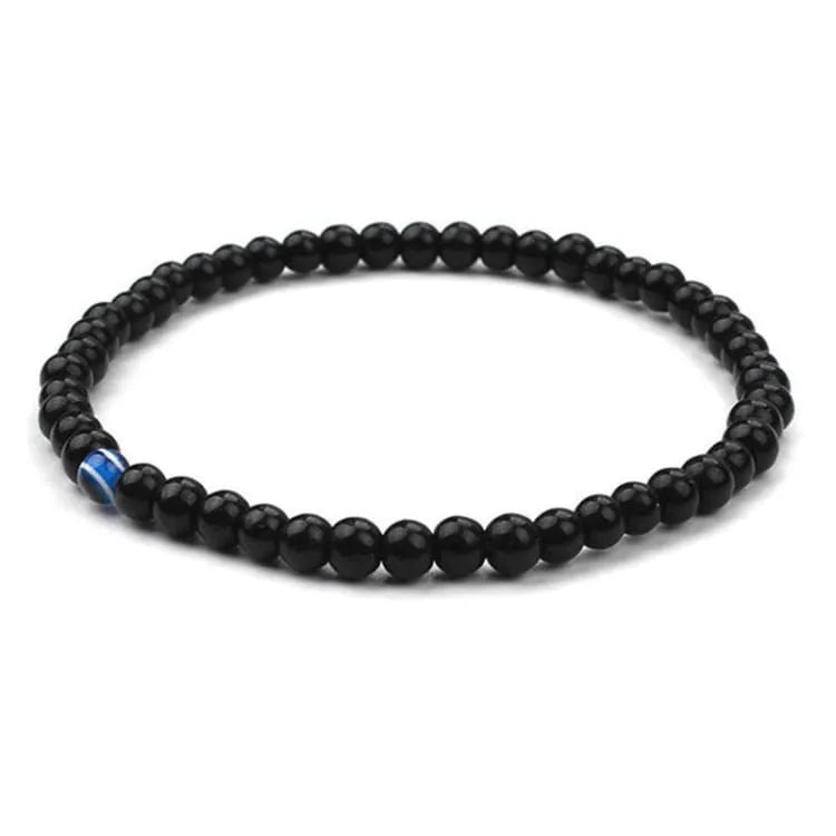 Brazalete Budista con Ojo Protector – Equilibrio y Espiritualidad