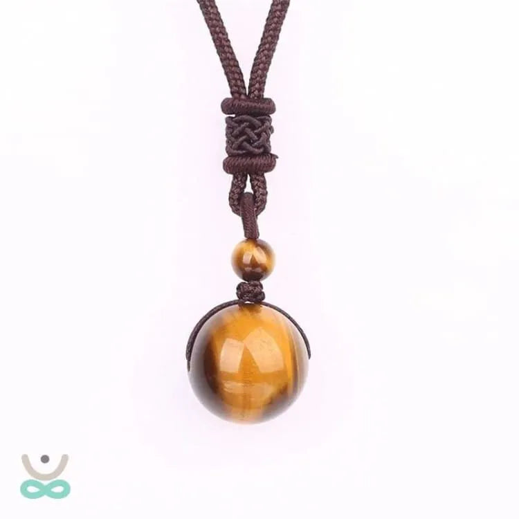 Colgante de Ojo de Tigre con Cordón Trenzado – Protección, Confianza y Equilibrio