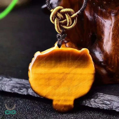 Collar trenzado con colgante de tigre en ojo de tigre