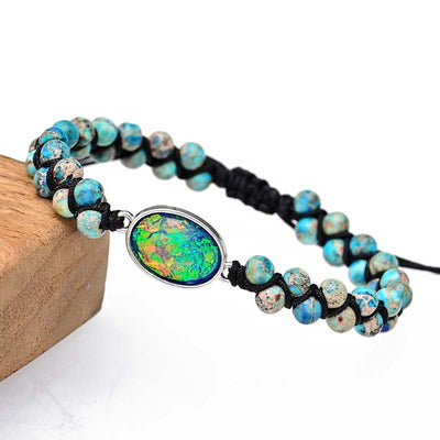 Pulsera Trenzada con Centro Iridiscente y Cuentas Jaspeadas