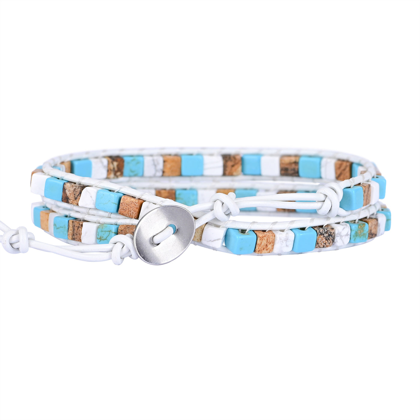 Pulsera de dos capas con ágata azul y blanca sobre cuero blanco, equilibrio emocional y serenidad consciente