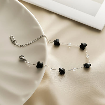 Renueva tu energía con la protección de la obsidiana y el lujo del titanio