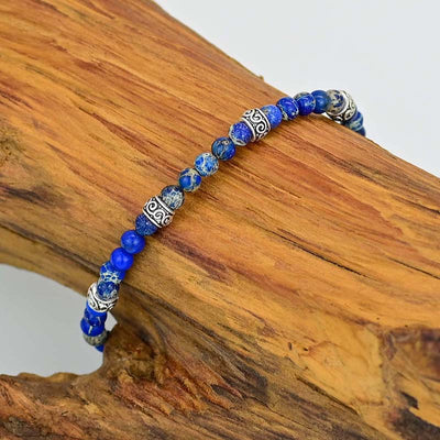 Pulsera Ajustable de Lapis Lazuli Natural con Detalles Étnicos Plateados