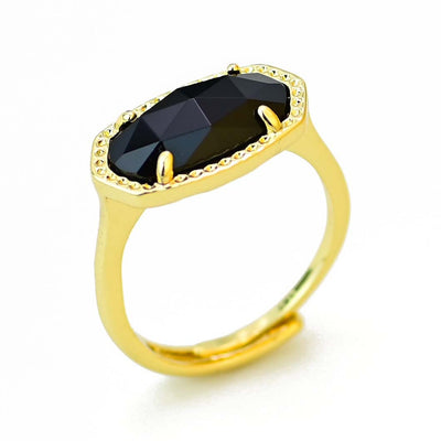 Anillo largo de obsidiana en cobre, protección energética y fuerza con carácter