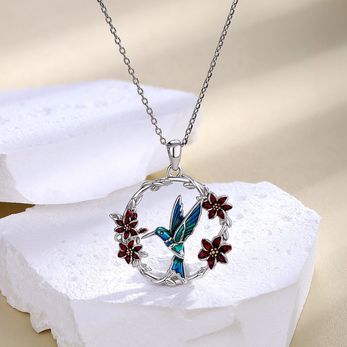 Collar colibrí y flor en plata 925, símbolo de alegría y amor por la vida