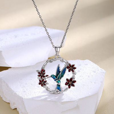 Collar colibrí y flor en plata 925, símbolo de alegría y amor por la vida