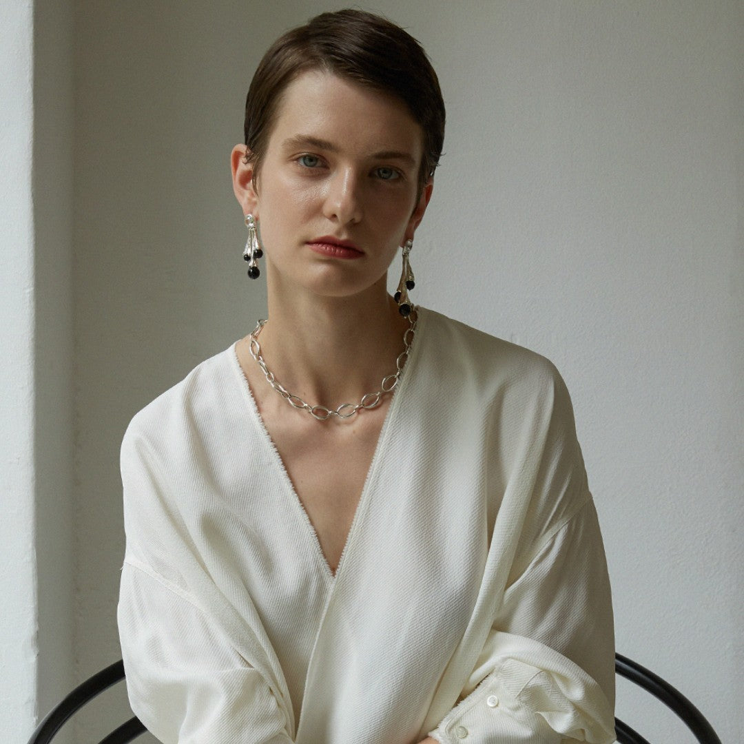 Energía protectora y estilo: Pendientes de obsidiana negra para mujer