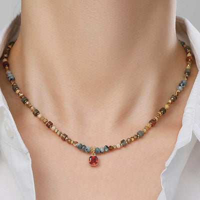 Collar espiritual vintage: energía y elegancia con rubí y turmalina