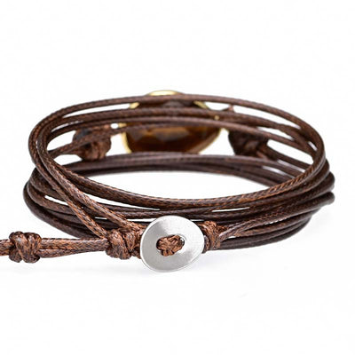 Pulsera envuelta en cuerda de parafina con colgante de ojo de tigre