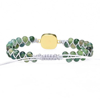Pulsera de Cuentas Verdes con Centro Iridiscente