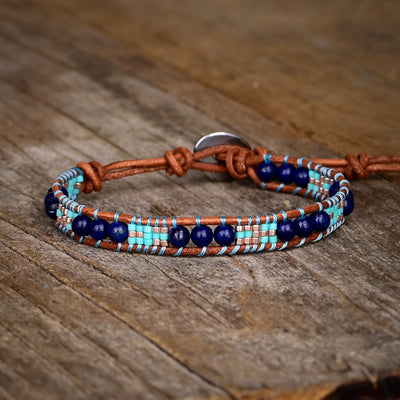 Pulsera de una capa con cuentas de lapislázuli en forma de arroz, claridad y protección interior