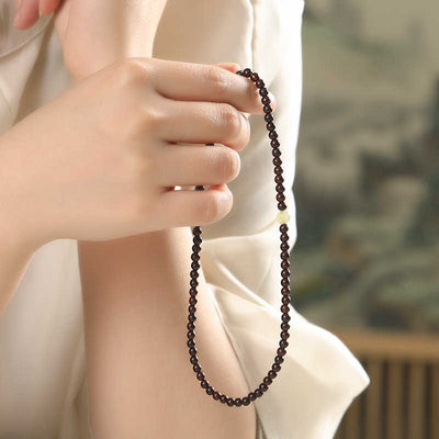 Pulsera de sándalo rojo y turmalina verde: Conexión y protección espiritual