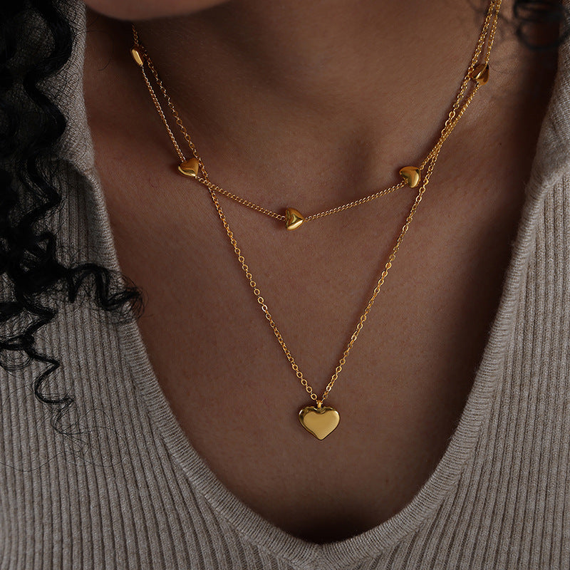 Collar Corazón Doble: Amuleto de Amor y Protección