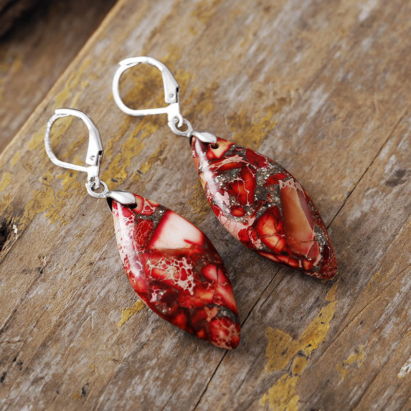 Brilla con Vitalidad y Optimismo: Pendientes de Goldstone Rojo Natural