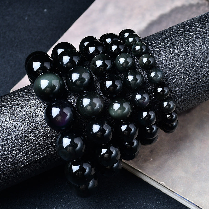 Armonía y protección: Pulsera de obsidiana arcoíris y ojos de colores