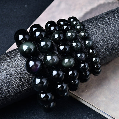Armonía y protección: Pulsera de obsidiana arcoíris y ojos de colores