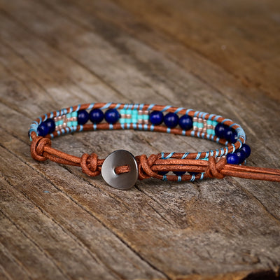 Pulsera de una capa con cuentas de lapislázuli en forma de arroz, claridad y protección interior