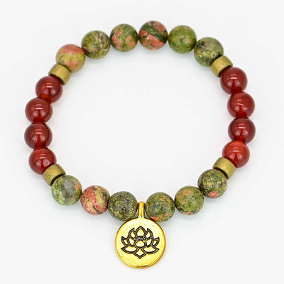 Pulsera de ágata roja con flor de loto – Energía y equilibrio interior