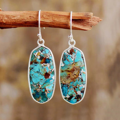 Luz Interior y Elegancia: Pendientes de Piedra Natural para Bienestar