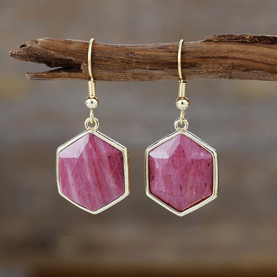 Armoniza Tu Energía y Confianza con Pendientes de Rodonita Natural