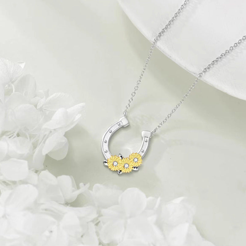 Collar herradura y girasol en plata 925, símbolo de suerte y energía positiva