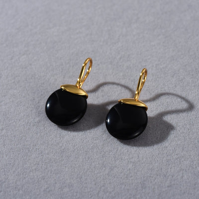Protección y equilibrio: Pendientes de obsidiana negra con oro 18K