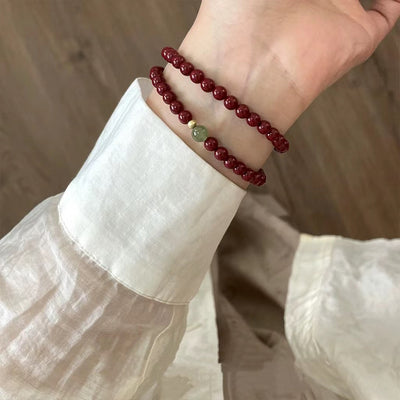 Pulsera auspiciosa de cinabrio y turmalina verde: protección y prosperidad