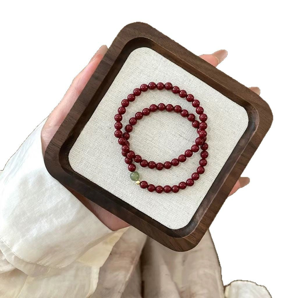 Pulsera auspiciosa de cinabrio y turmalina verde: protección y prosperidad