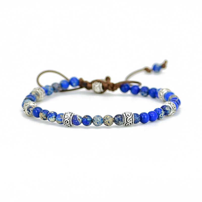 Pulsera Ajustable de Lapis Lazuli Natural con Detalles Étnicos Plateados