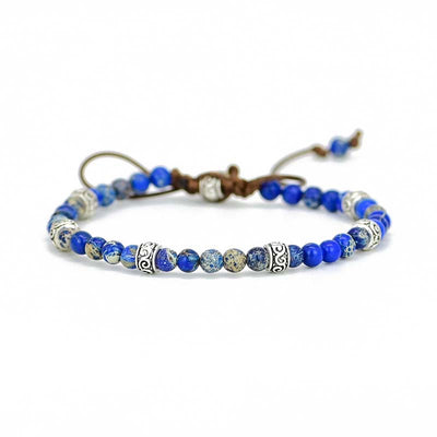 Pulsera Ajustable de Lapis Lazuli Natural con Detalles Étnicos Plateados