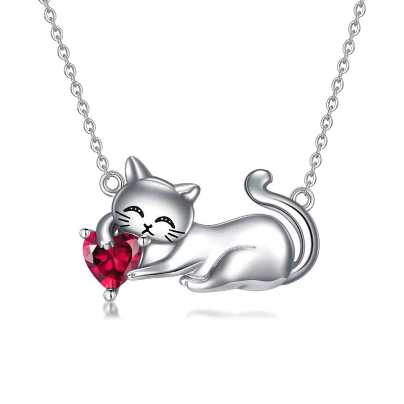 Collar gato en plata 925 con granate rojo, ternura y pasión en un diseño único