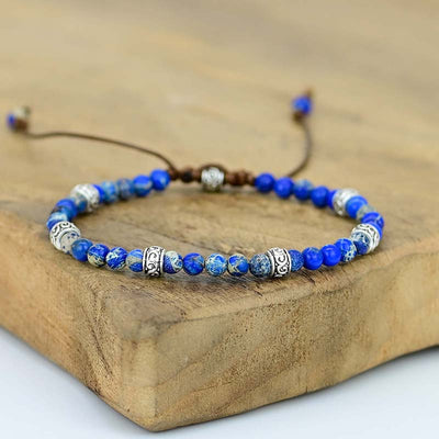 Pulsera Ajustable de Lapis Lazuli Natural con Detalles Étnicos Plateados