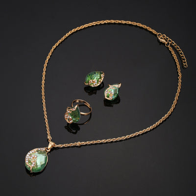 Reloj de Cuarzo Verde con Flor de Diamante y Set de Joyas de Perlas: Elegancia y Energía en tu Día