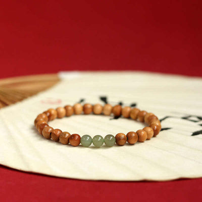 Pulsera de Armonía y Suerte con Aventurina en Madera de Melocotón