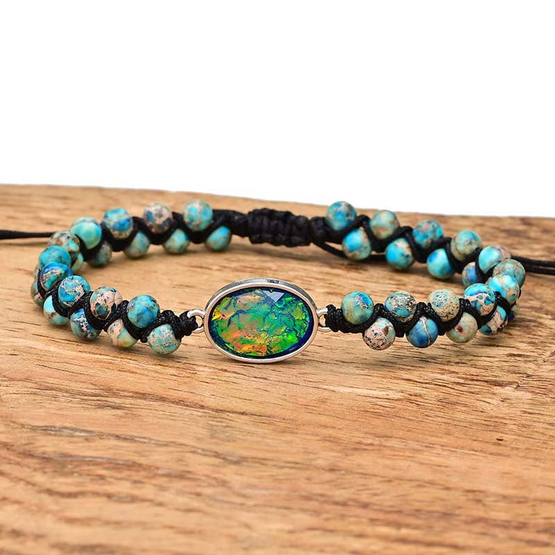 Pulsera Trenzada con Centro Iridiscente y Cuentas Jaspeadas