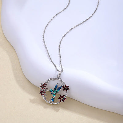 Collar colibrí y flor en plata 925, símbolo de alegría y amor por la vida