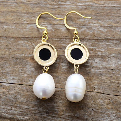 Pendientes de nácar y perla: elegancia, pureza y energía revitalizante