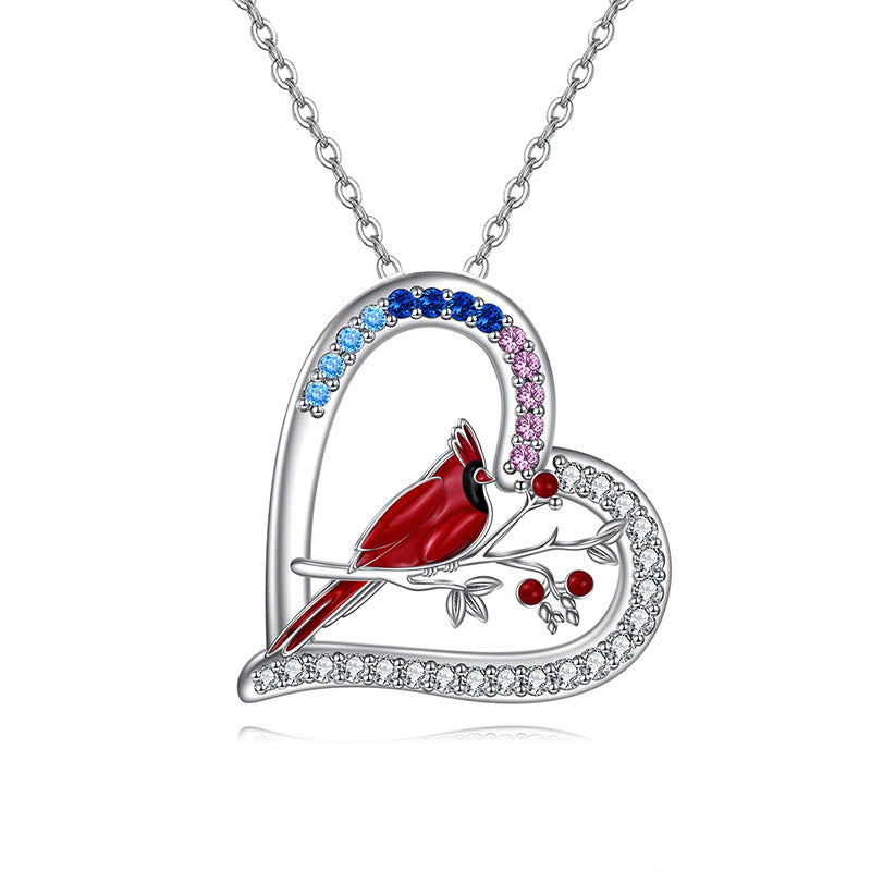 Collar loro rojo del amor en plata 925, joya vibrante y símbolo de afecto libre