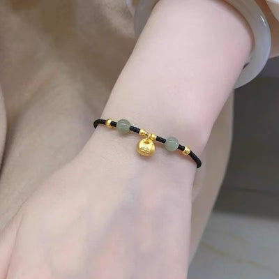 Pulsera de Buenas Energías con Cuentas Doradas y Trenzado