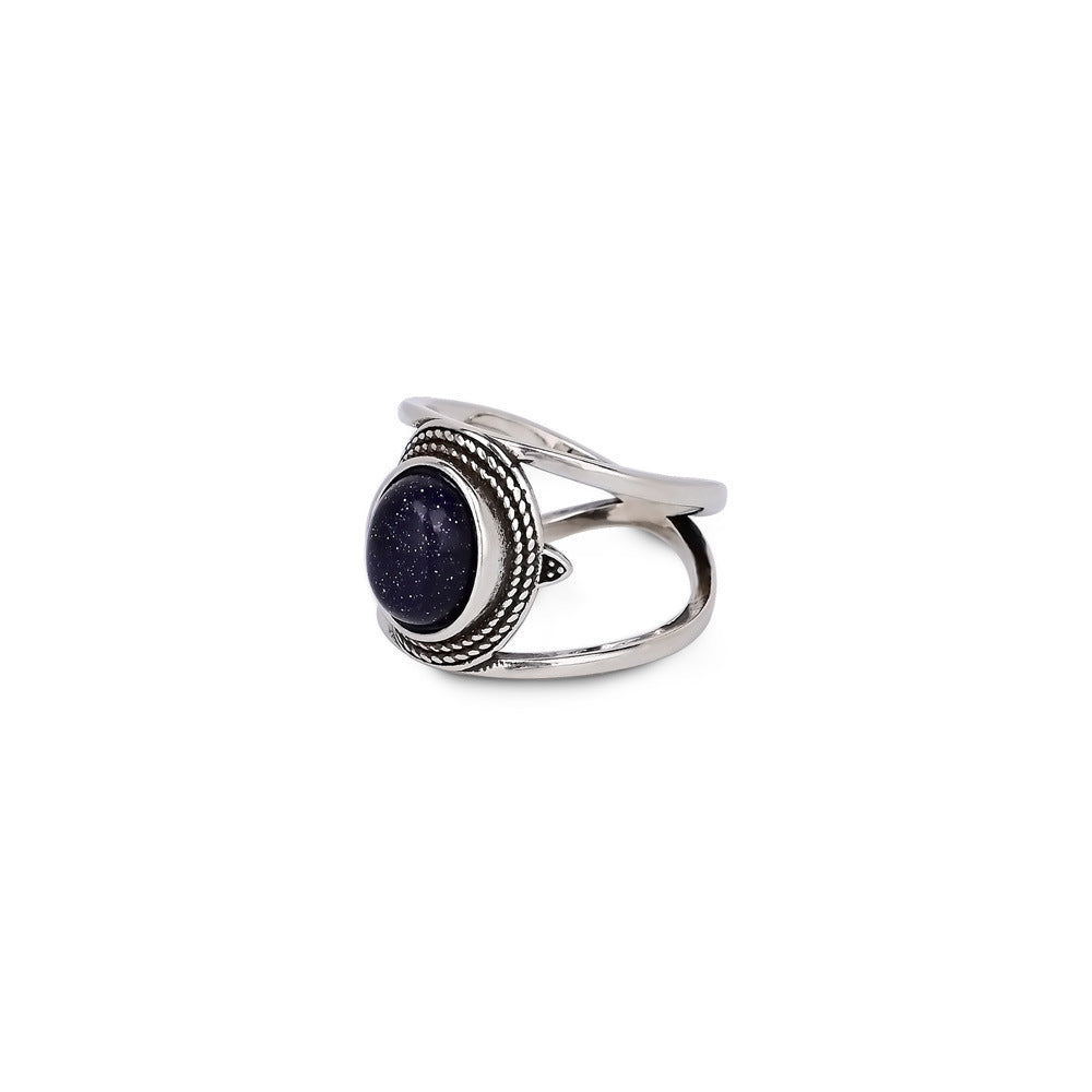 Anillo de arenisca azul ovalada chapado en cobre, concentración brillante y estilo cósmico
