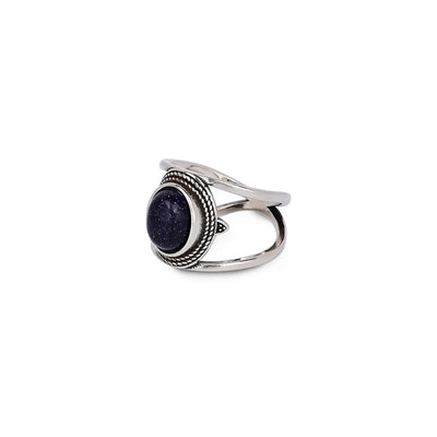 Anillo de arenisca azul ovalada chapado en cobre, concentración brillante y estilo cósmico