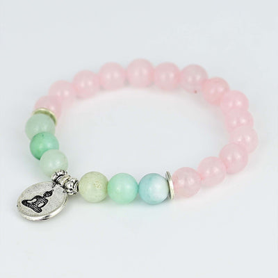 Pulsera de cuarzo rosa con Cabeza de Buda – Amor y paz interior