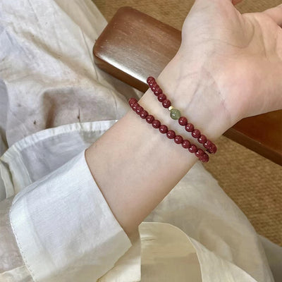 Pulsera auspiciosa de cinabrio y turmalina verde: protección y prosperidad