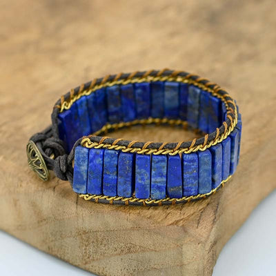 Pulsera de cadena larga con lapislázuli y cuero trenzado, sabiduría ancestral y estilo bohemio