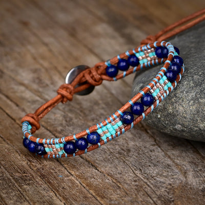 Pulsera de una capa con cuentas de lapislázuli en forma de arroz, claridad y protección interior